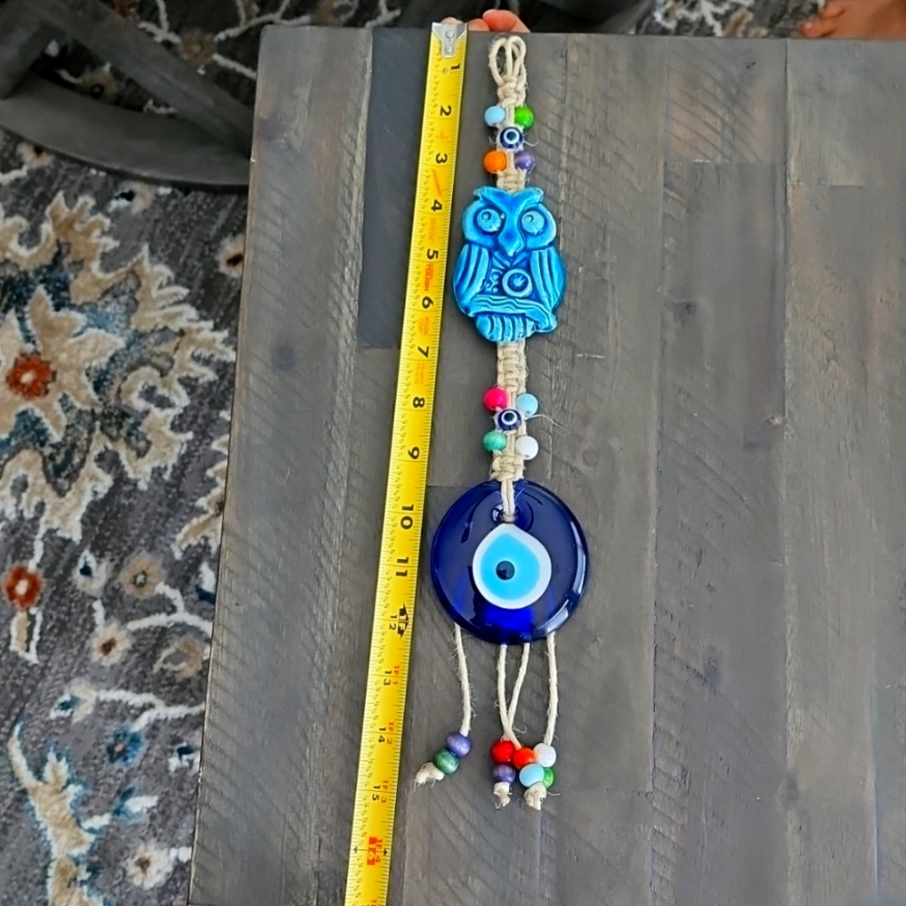 Ceramic owl with  large evel eye wall decor